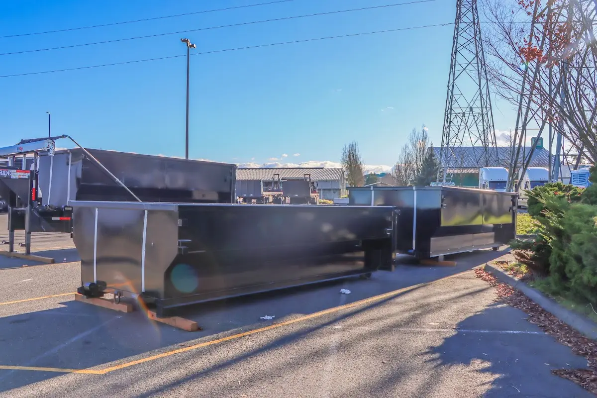 Roll-off dumpster ready for waste disposal at job site for Commercial Dumpster Rental in Sawmills